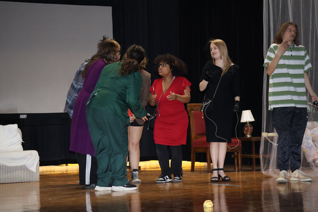 students rehearsing for play