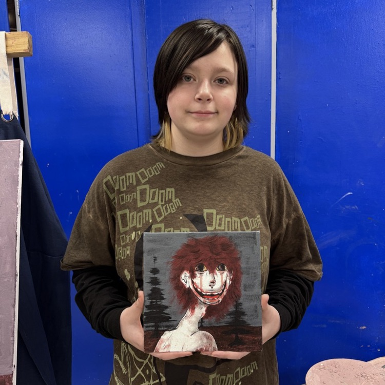 student with artwork