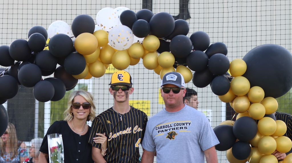 senior baseball player and family