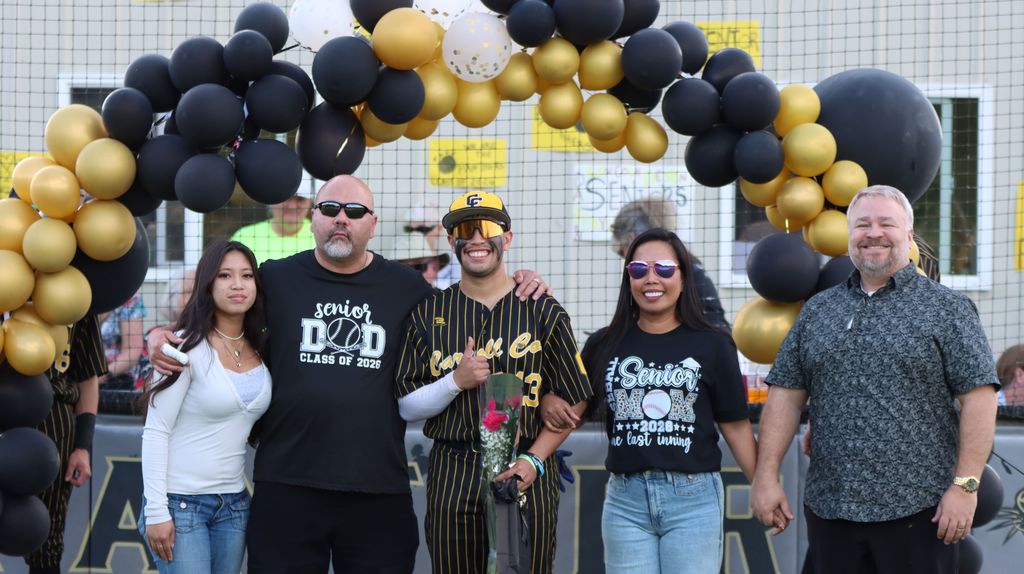senior baseball player and family