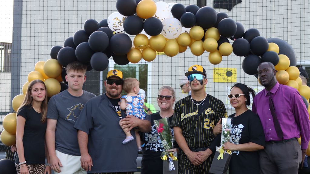 senior baseball player and family