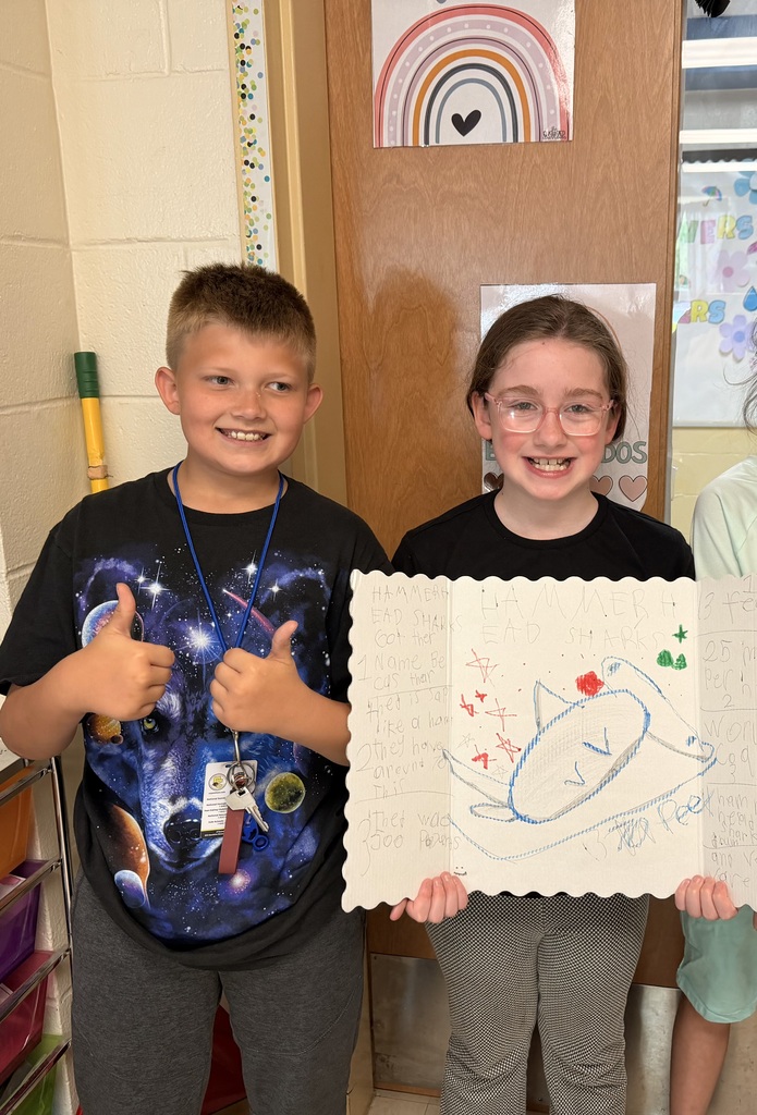 students displaying project