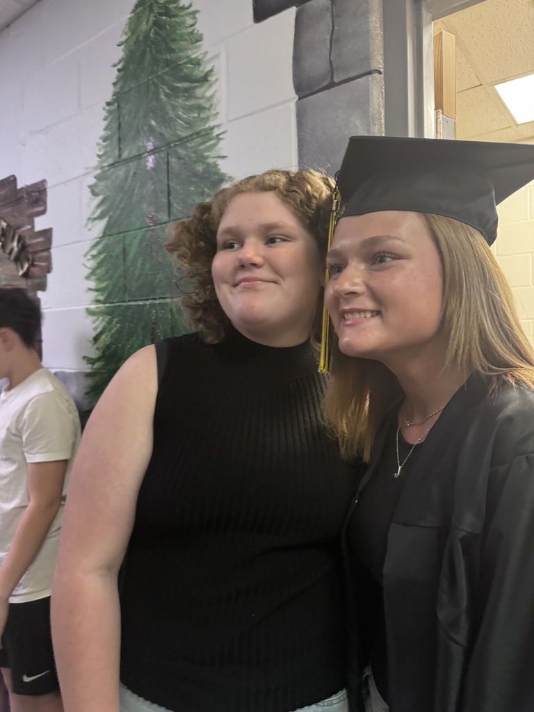 sister hugging senior