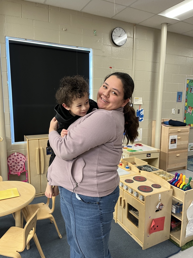 student working with child