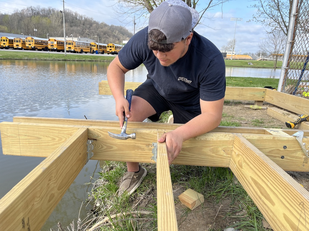 student working on boardwalk project