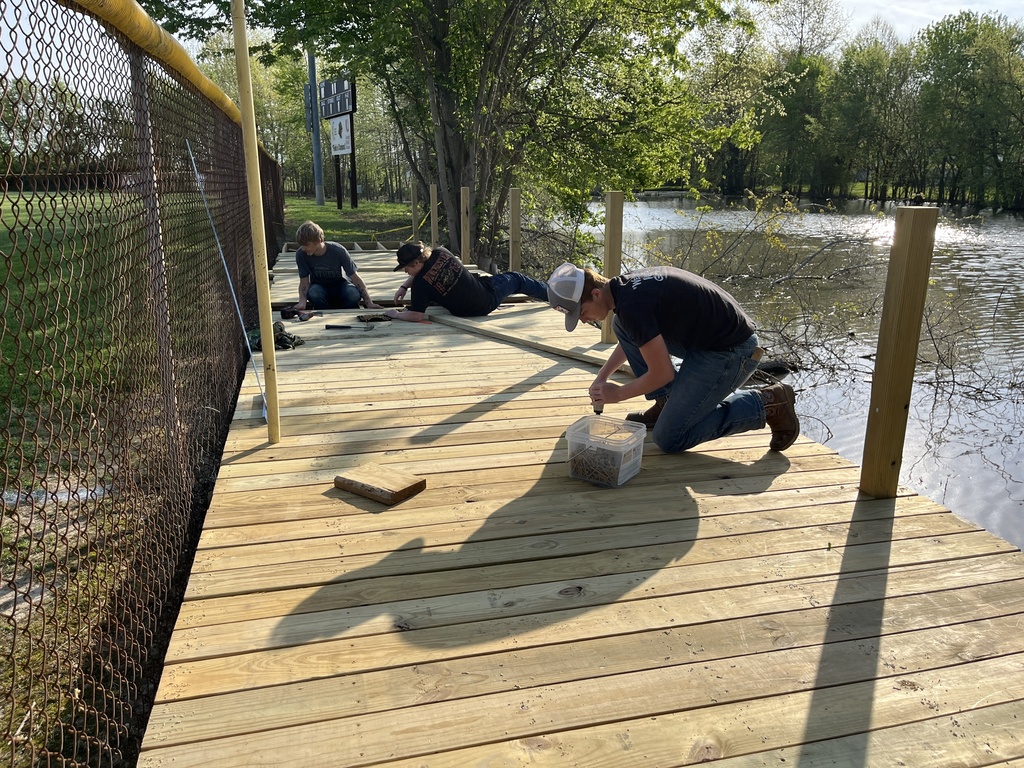 students working on boardwalk project
