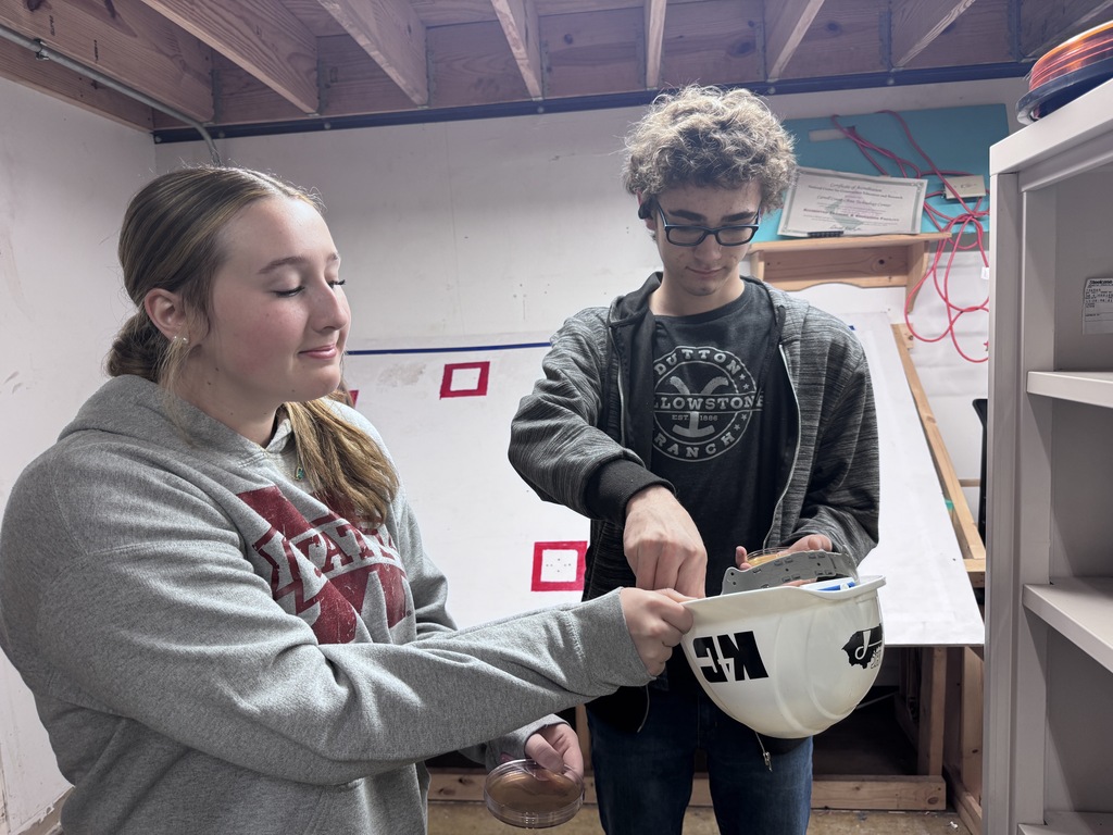 Nursing student swabbing for germs
