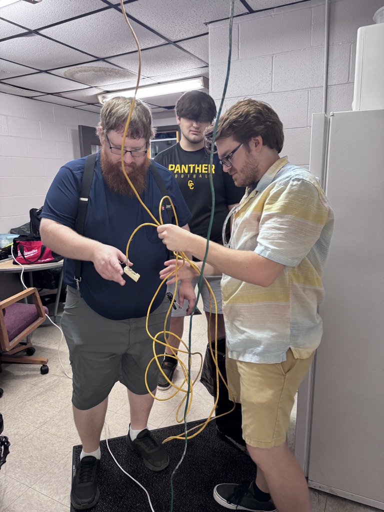 technology department working on wiring