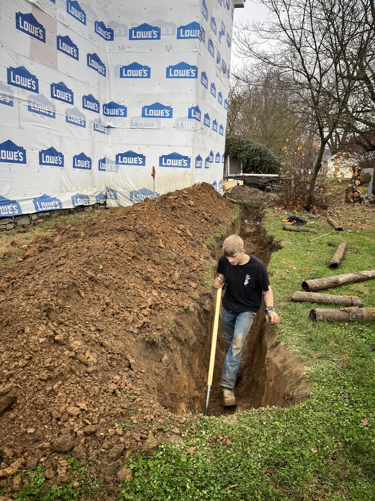 Student learning plumbing trade