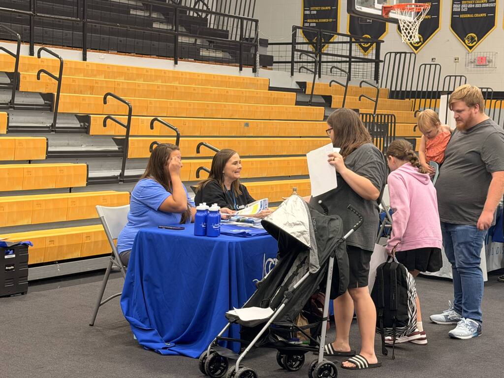 Families walking through booths at Ready Fair