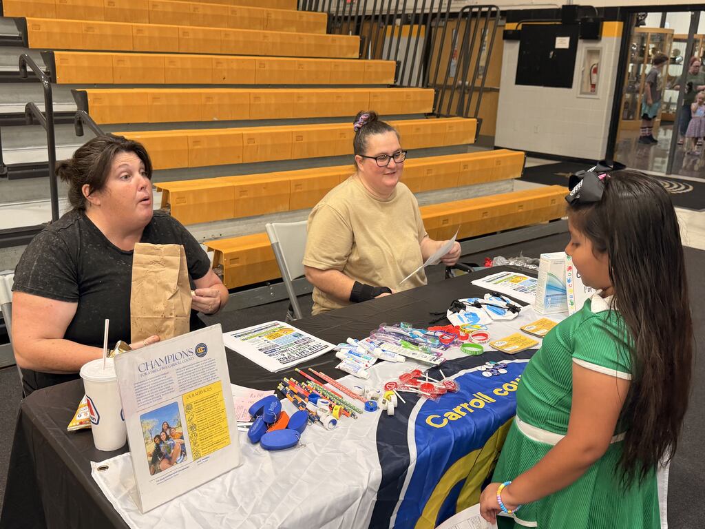 Families walking through booths at Ready Fair
