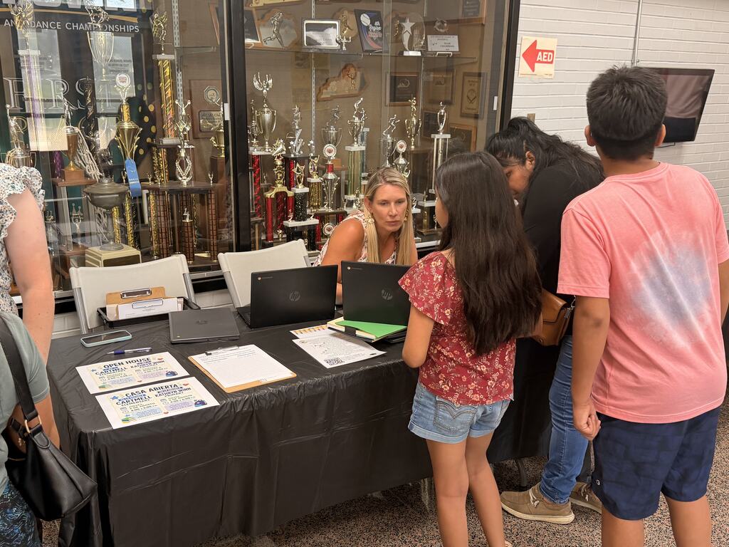 Families walking through booths at Ready Fair