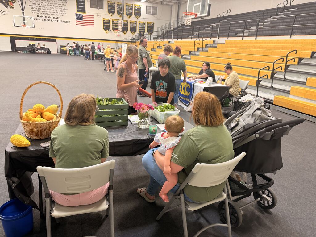 Families walking through booths at Ready Fair