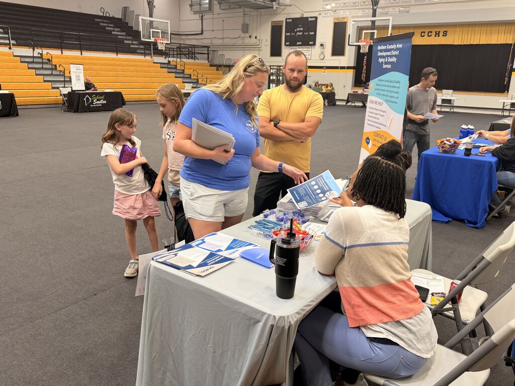 Families walking through booths at Ready Fair