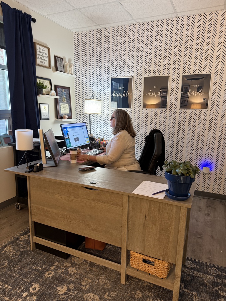 Instructional coach in her office
