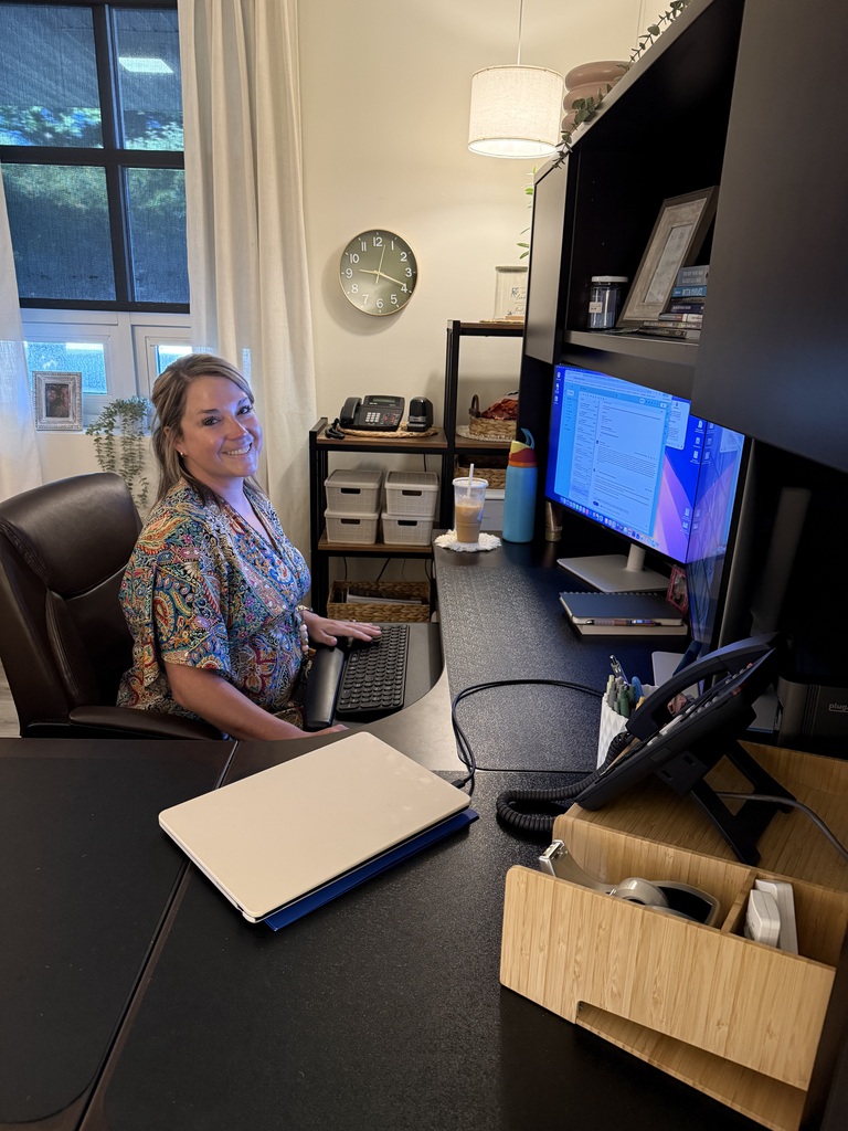 Principal in her office