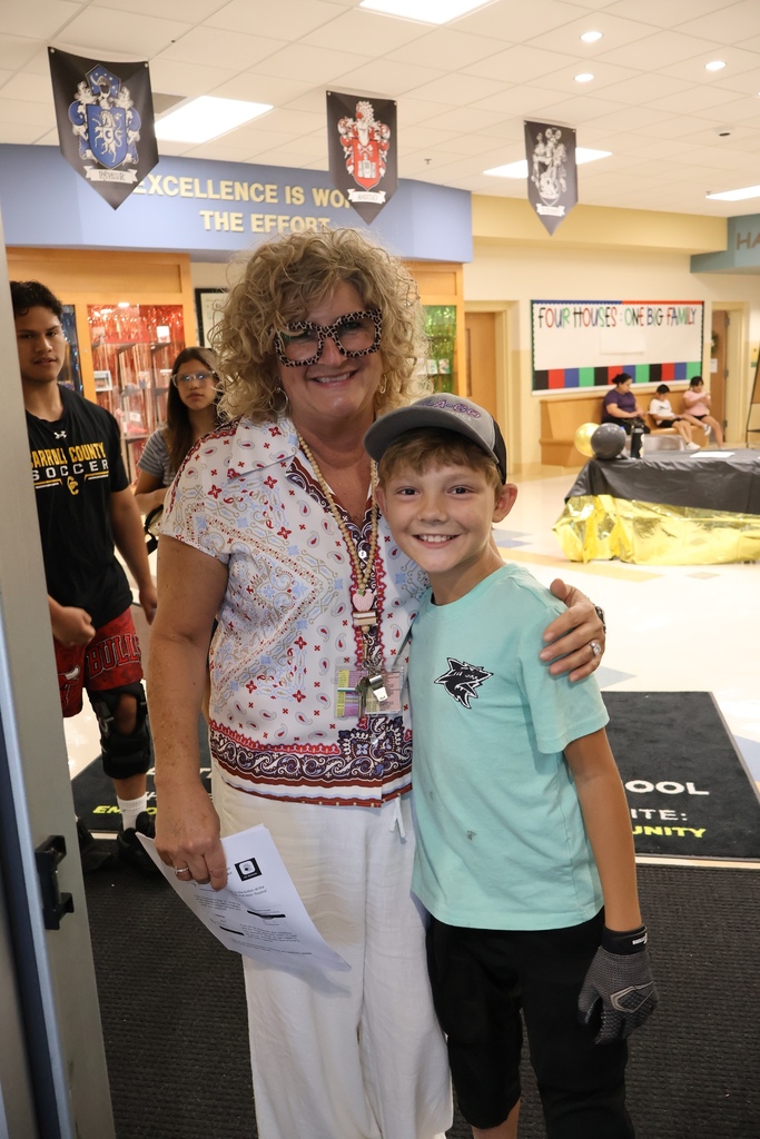 Student and teacher at open house