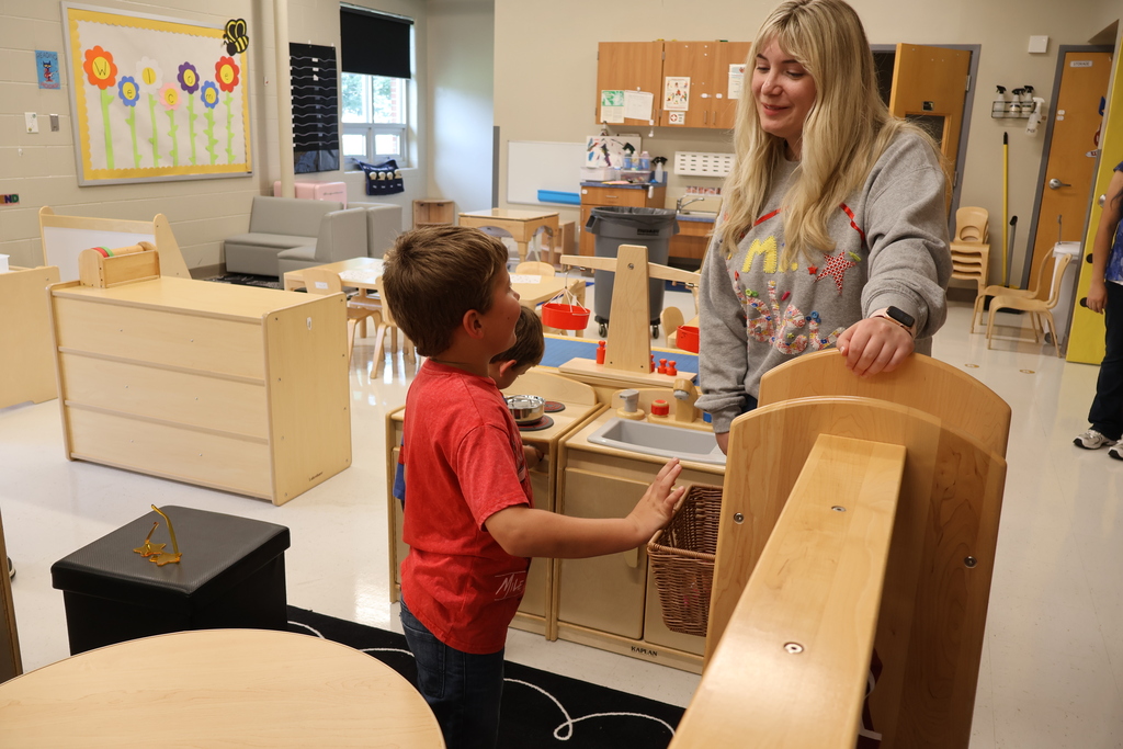 Student talking to teacher