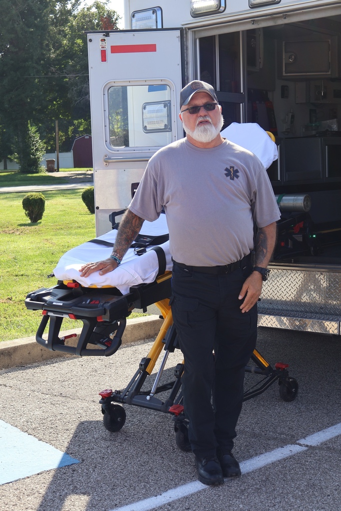 EMT with gurney