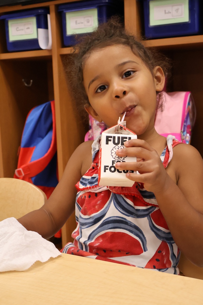 child drinking milk