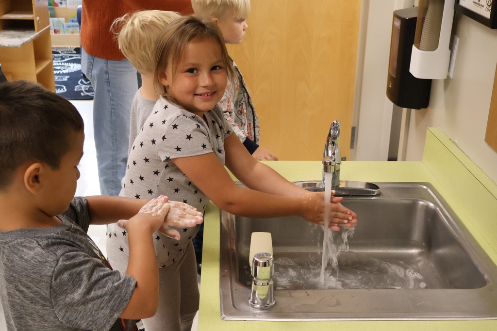children washing hands