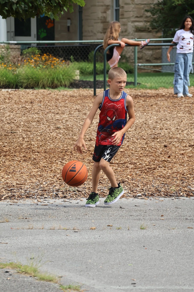 Student playing on playground