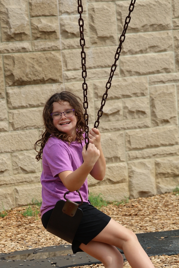 Student playing on playground