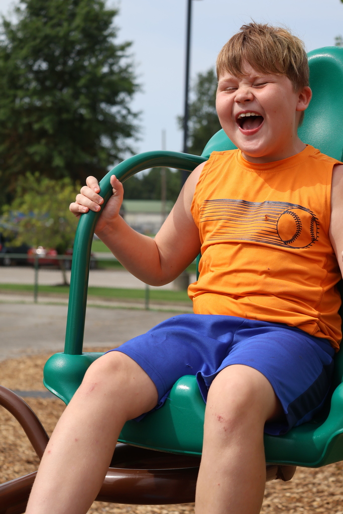 Student playing on playground