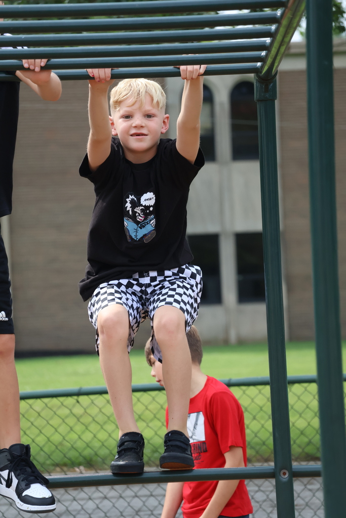 Student playing on playground