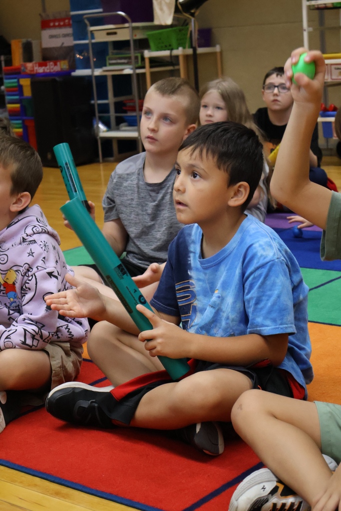 student in music class