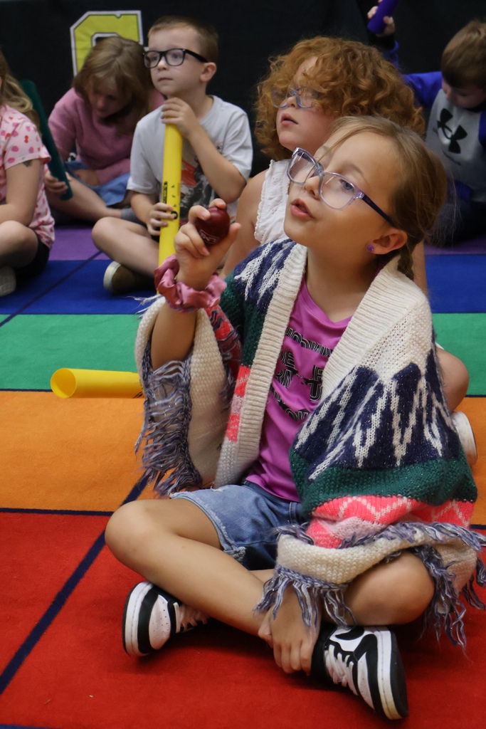 student in music class