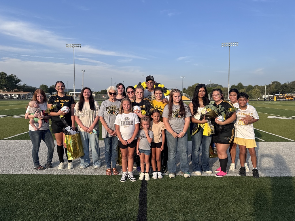 Senior soccer players and families