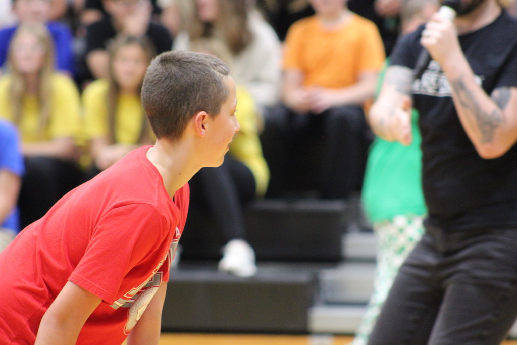 Photo of student participant in the game of Red Light, Green Light.