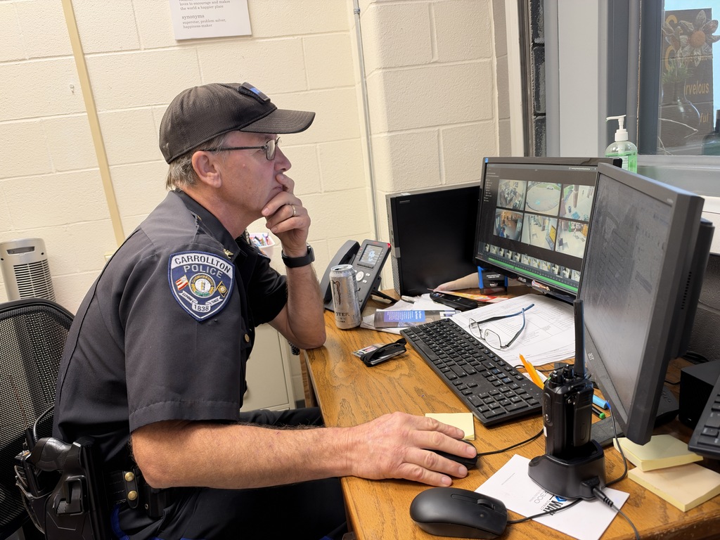 Officer looking at computer