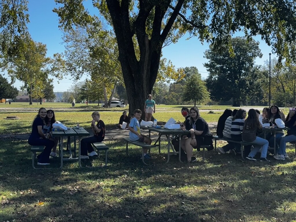 Photo from Orchestra Trip of students having lunch together