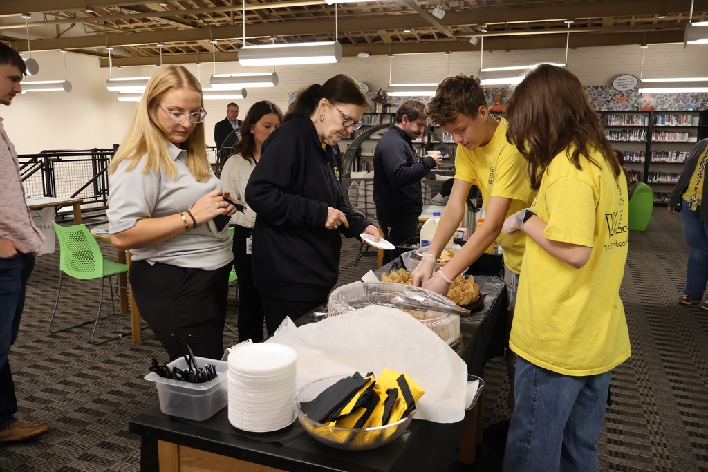 WEB Leaders serving food