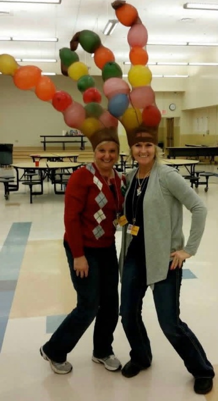 Leaders wearing balloon hats