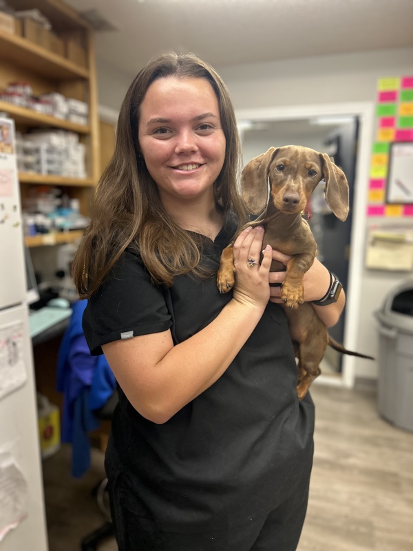 student and dog