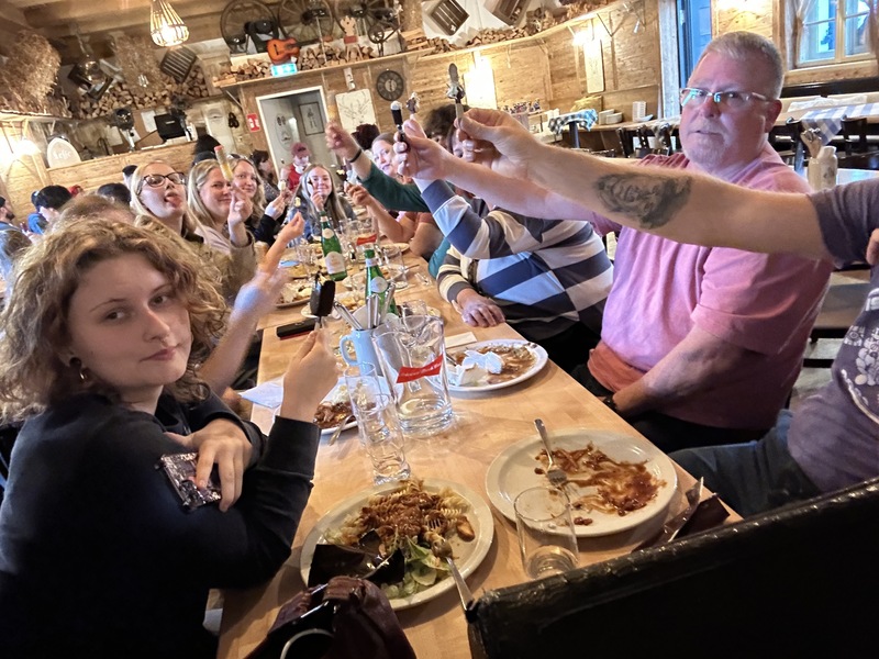 Students eating dinner at table