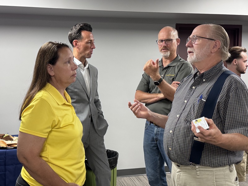 Adults talking after meeting