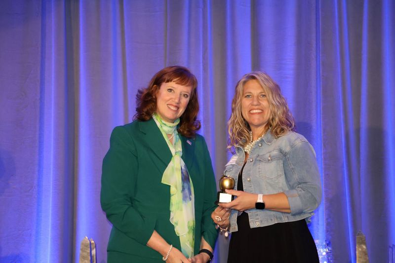 Teacher receiving Golden Apple award