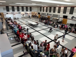 parents and students getting school supplies