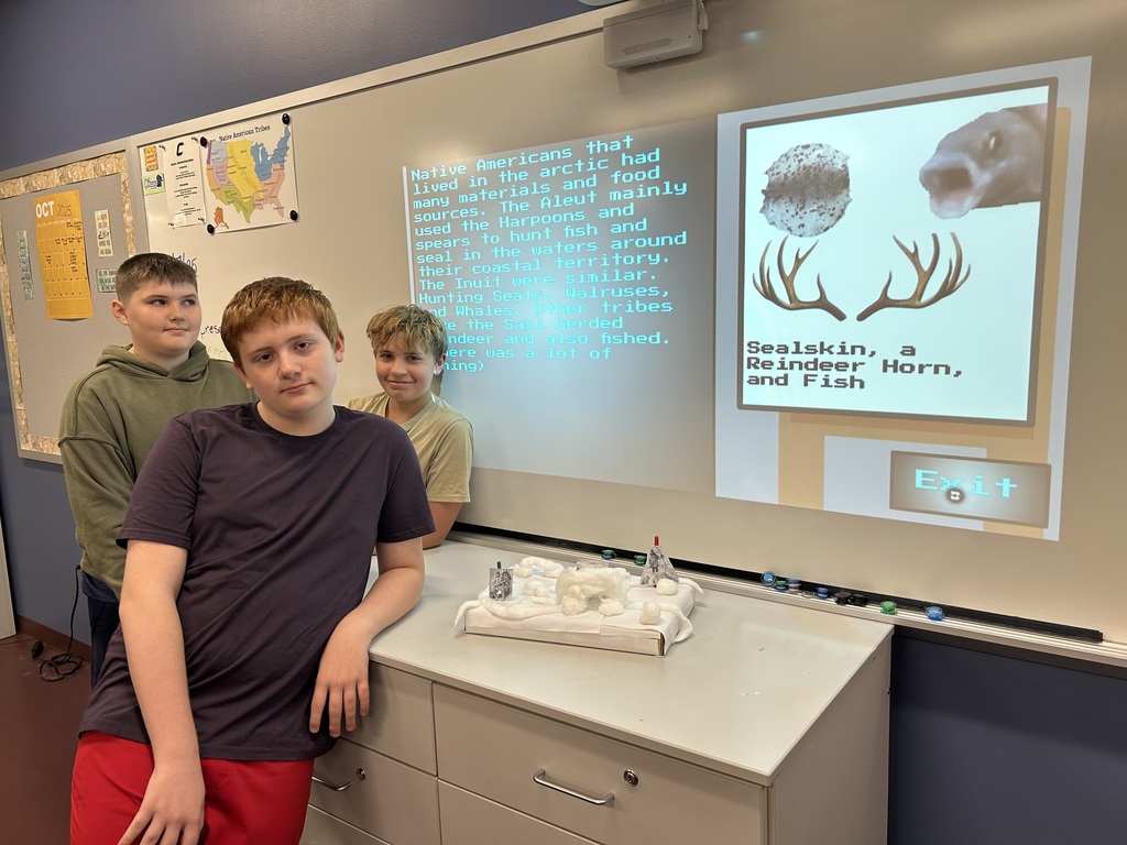 students posing with their project