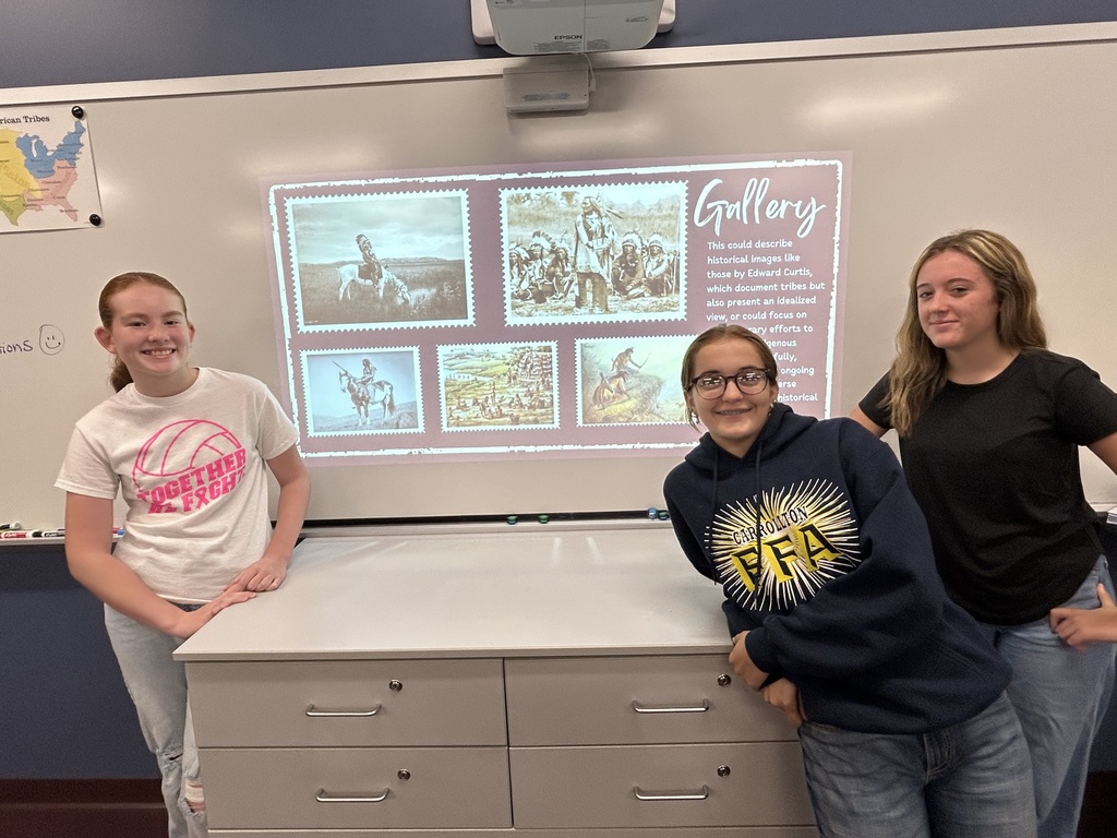 students posing with their project