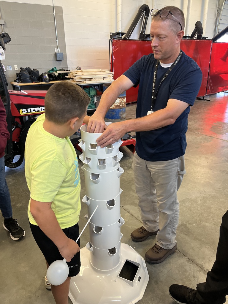 students and teacher working