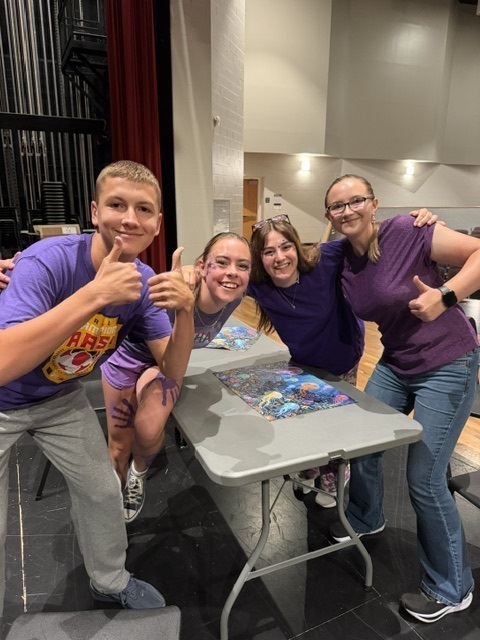 students and teacher working