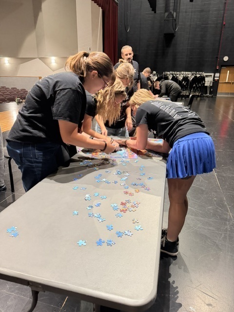 students and teacher working