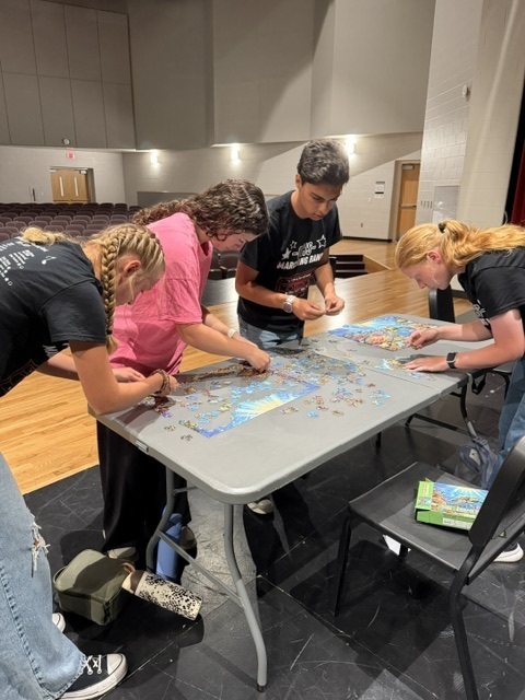 students working on puzzles