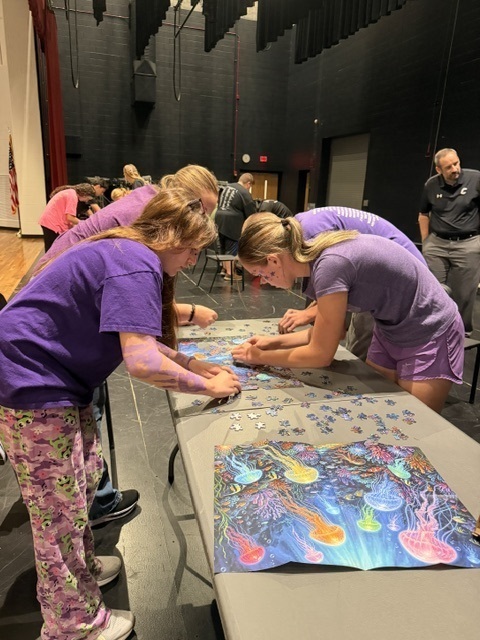 students and teacher working