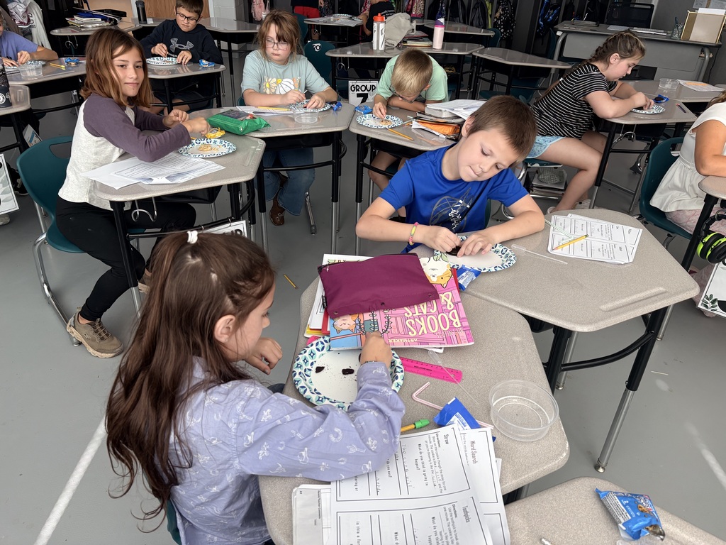 students and teacher working